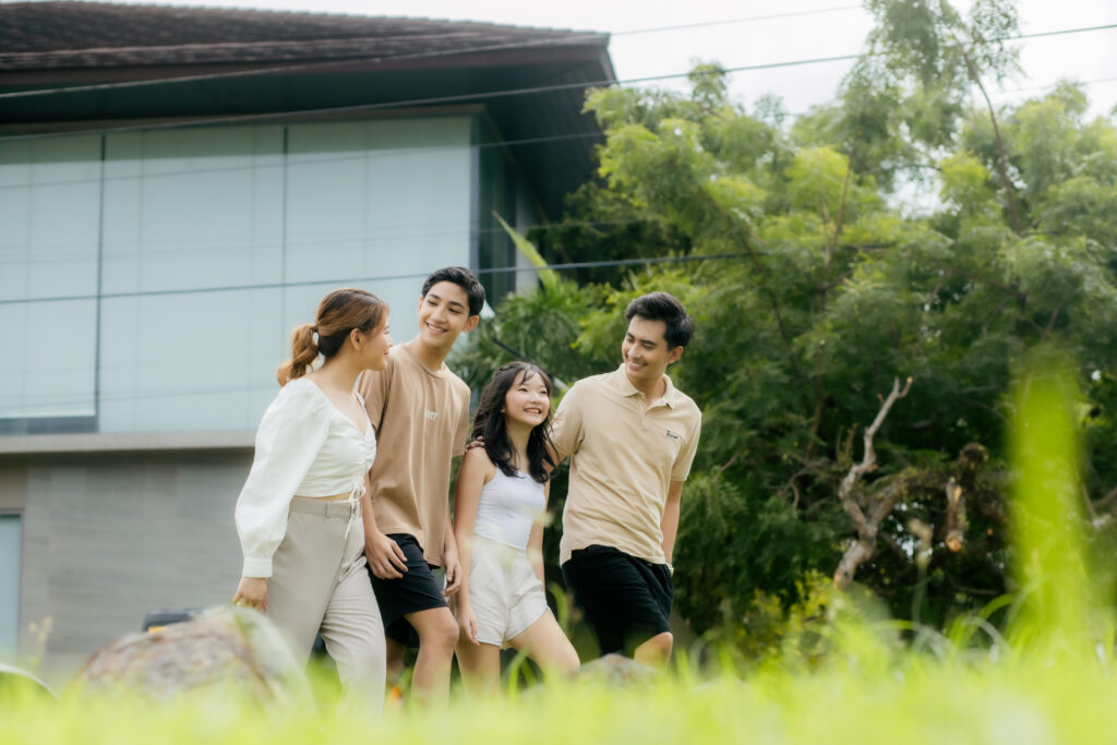 Lifestyle photo: a family strolling in a secured community